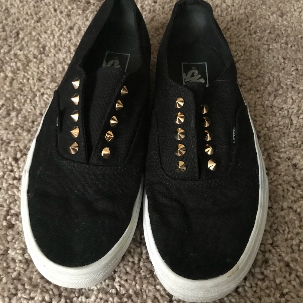 Black / gold spiked cans slip ons